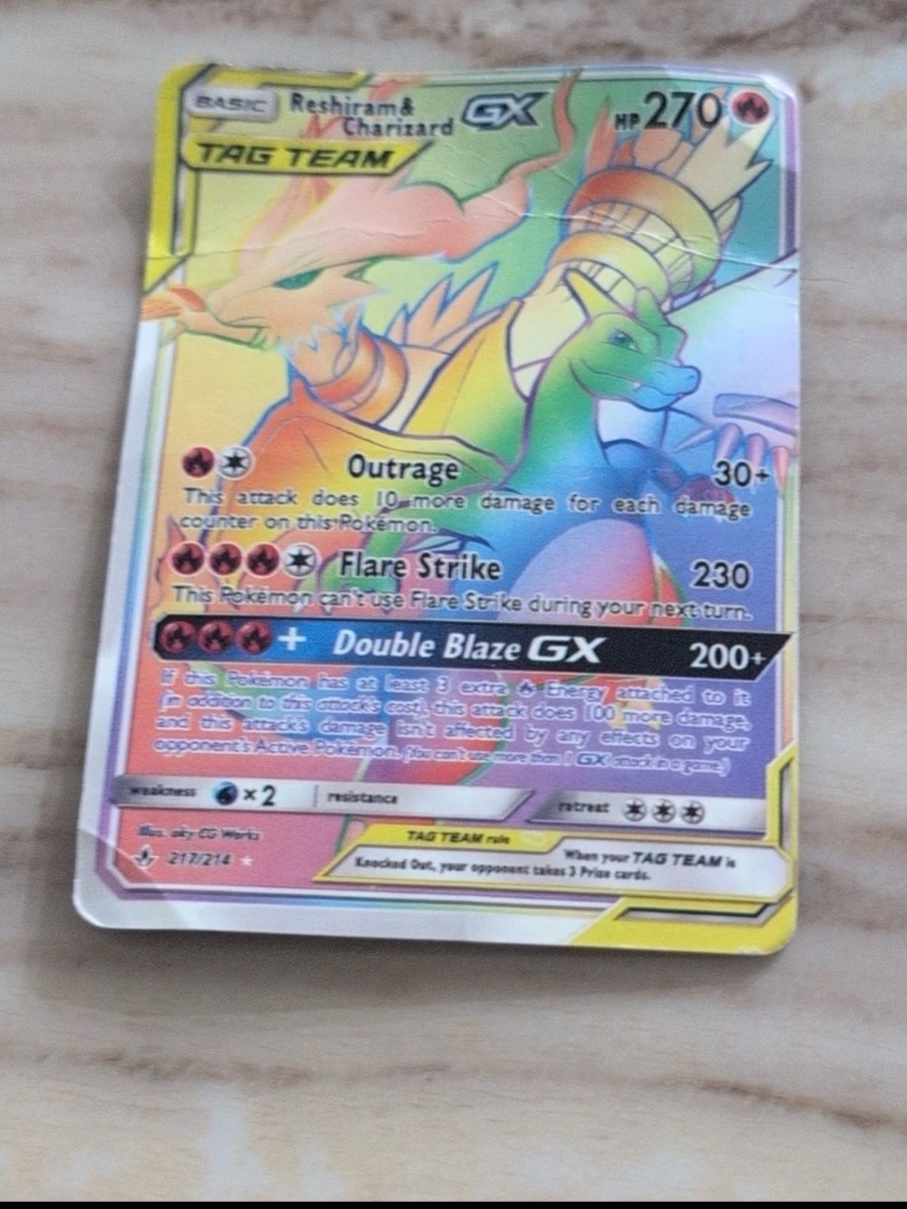 Pokemon Reshiram & Charizard GX Rainbow Holo Card - Yellow Green Blue